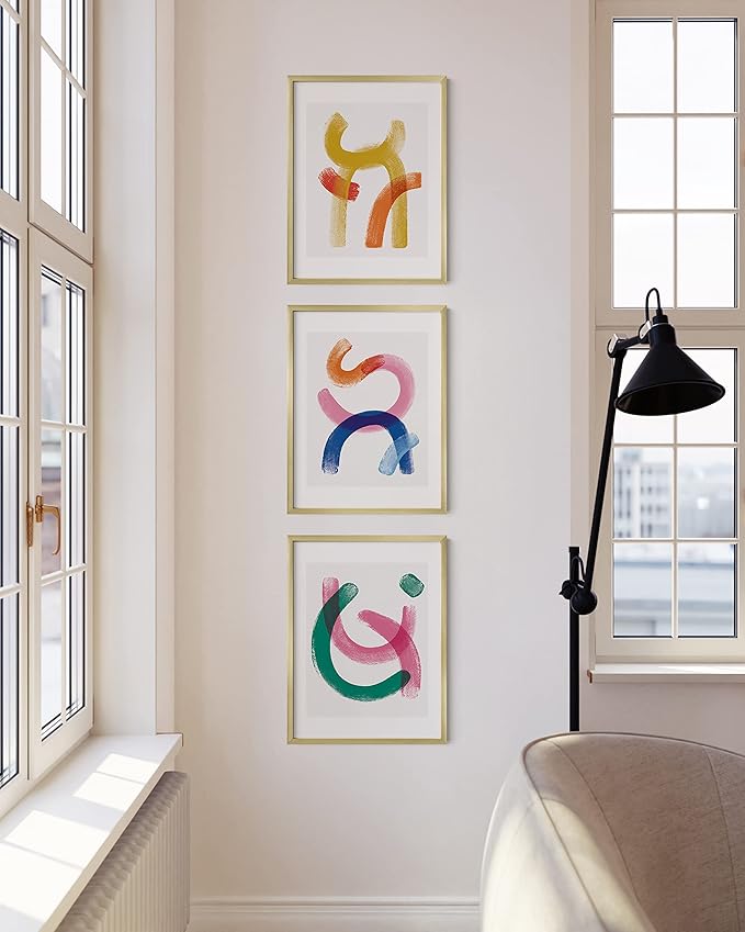 HAUS AND HUES 12x16 Gold Picture Frames - Modern Aluminum Wall Art Display - Lightweight 12x16 Frames for Posters, Prints, Photos - Ready-to-Hang Vertically & Horizontally (Set of 3)